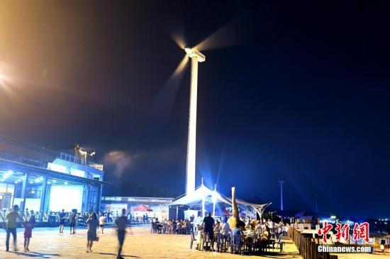 风电车。 <a target='_blank'  data-cke-saved-href='http://www.chinanews.com/' href='http://www.chinanews.com/'>中新社</a>记者 王东明 摄